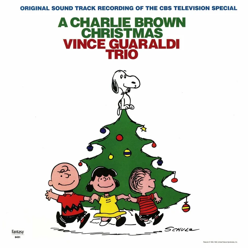 Vince Guaraldi Trio - A Charlie Brown Christmas (Exclusive Snowstorm Vinyl) Express Delivery