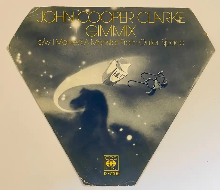 Budget John Cooper Clarke - Gimmix 7" Vinyl (Shaped Orange Vinyl)– museum vinyl